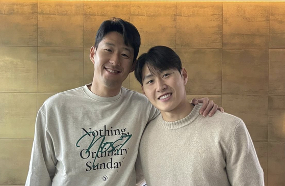 Son Heung-min, left, and Lee Kang-in pose together in a photo posted on Son's official Instagram account on Wednesday. [Screen captured from Son's Instagram]