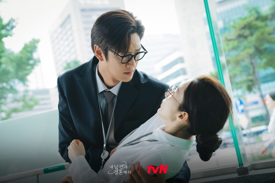 Park Min-young, right, and her co-star Na in-woo in "Marry My Husband" [TVN]