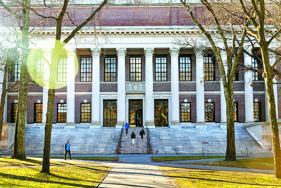 The Harry Elkins Widener Memorial Library at Harvard University in Cambridge, Mass., Dec. 12, 2023. Faculty and students at Harvard are looking for some signal from the governing board, the Harvard Corporation, about the university’s future direction. [Adam Glanzman/The New York Times]