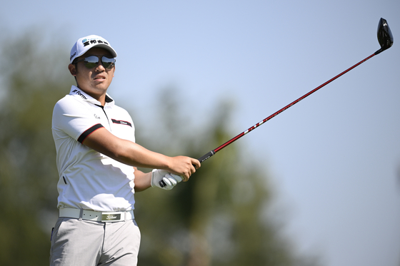 C.T. Pan of Taiwan plays his shot from the third tee during the final round of the Mexico Open at Vidanta at Vidanta Vallarta in Puerto Vallarta, Jalisco on Sunday. [GETTY IMAGES]