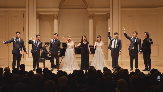 Green Voice, also known as Miracle Voice Ensemble, performs at Carnegie Hall in New York. [MIRACLE VOICE ENSEMBLE] 