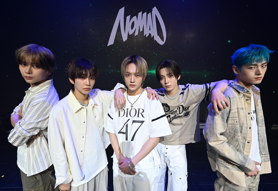 Rookie boy band Nomad poses for the camera during the band's debut press showcase, held Wednesday morning in Gangnam District, southern Seoul. [NOMAD ENTERTAINMENT]