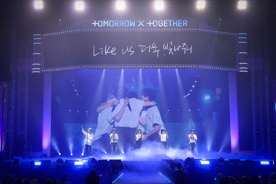 Boy band Tomorrow X Together performing at the ″2024 TXT Fanlive Present X Together,″ a meet and greet held on March 2 and 3 to celebrate the band's fifth anniversary of debut [BIGHIT MUSIC]