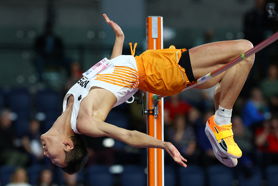 Korea's Woo Sang-hyeok competes in the men's high jump final at the World Athletics Indoor Championships in Glasgow, Scotland. [REUTERS/YONHAP]