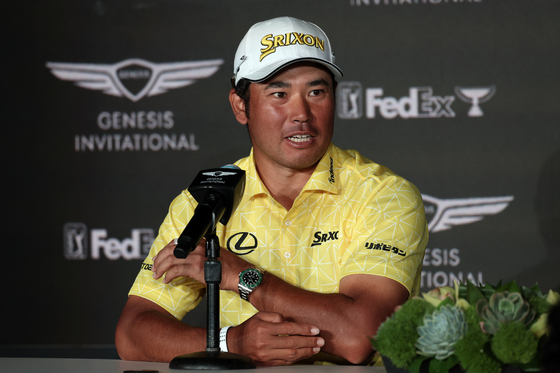 Hideki Matsuyama of Japan speaks to the media during a press conference after winning The Genesis Invitational at Riviera Country Club in Pacific Palisades, California on Feb. 18. [GETTY IMAGES]
