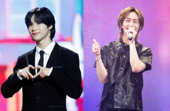 Taemin, left, and Onew of boy band SHINee. [NEWS1, SM ENTERTAINMENT]