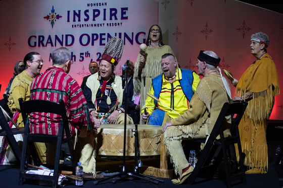 Mohegan musical group The Unity of Nations performs traditional tribal songs during Inspire Resort's opening ceremony on Tuesday in Incheon. [NEWS1]