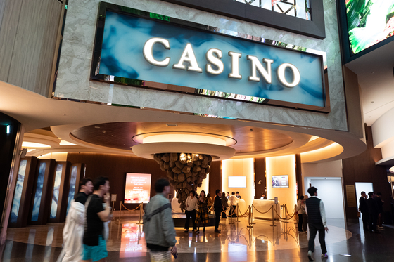 Visitors walk by Inspire Casino, Korea's largest foreigners-only casino that opened this month. [NEWS1]