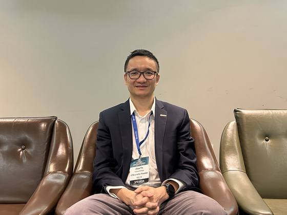 Alex Yu, founder and chief technology officer at Factorial Energy, takes a photo during an interview with the Korea JoongAng Daily on the sidelines of InterBattery 2024 in Coex, southern Seoul on Thursday. [SARAH CHEA] 