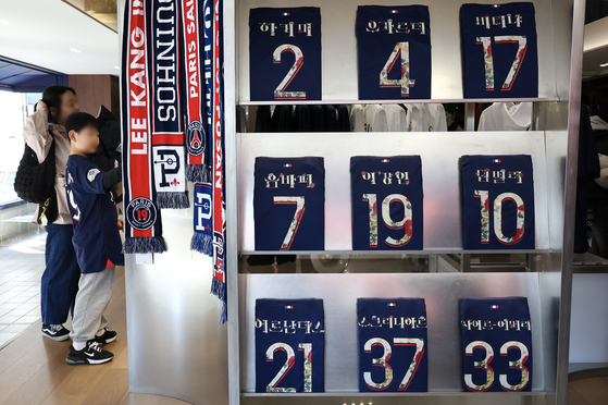 PSG shirts are displayed at the French club's new Seoul store in Gangnam, southern Seoul on Sunday.  [YONHAP]