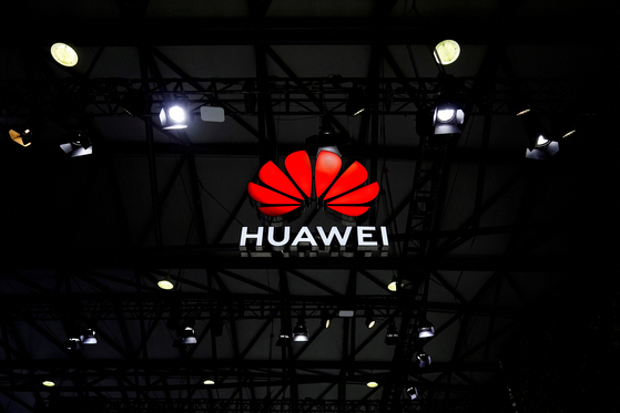 FILE PHOTO: A Huawei logo is seen at the Mobile World Congress (MWC) in Shanghai, China February 23, 2021. [REUTERS/YONHAP]