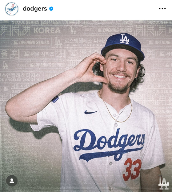 James Outman attempts the trendy half-heart-to-the-cheek pose in a photo uploaded on the Los Angeles Dodgers Instagram page on Tuesday.  [SCREEN CAPTURE]