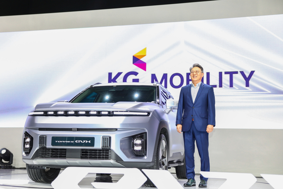 KG Mobility Chairman Kwak Jea-sun poses with a Torres EVX during a press event held at Kintex, Gyeonggi, in March. [NEWS1] 