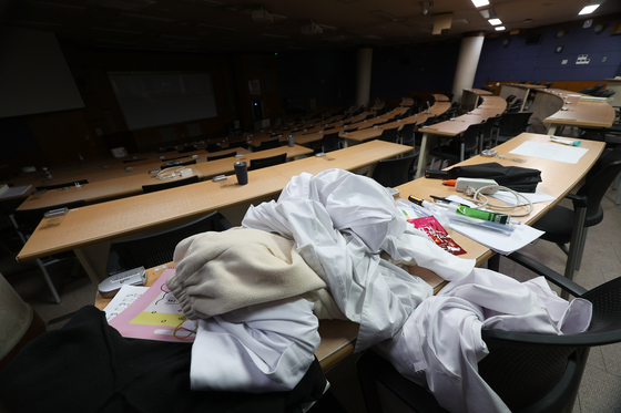 A college lecture hall at a medical college in Daegu is empty on Friday as students filed a leave of absence to protest against the government's decision to expand enrollment quota at medical colleges. [YONHAP]