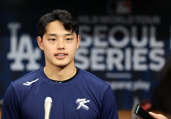 Moon Dong-ju speaks to reporters at Gocheok Sky Dome in western Seoul on Saturday.  [NEWS1]