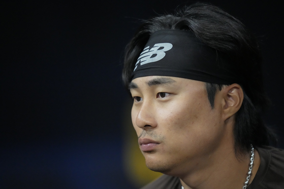 San Diego Padres' Kim Ha-seong looks on during a baseball workout at Gocheok Sky Dome in western Seoul on Saturday.  [AP/YONHAP]