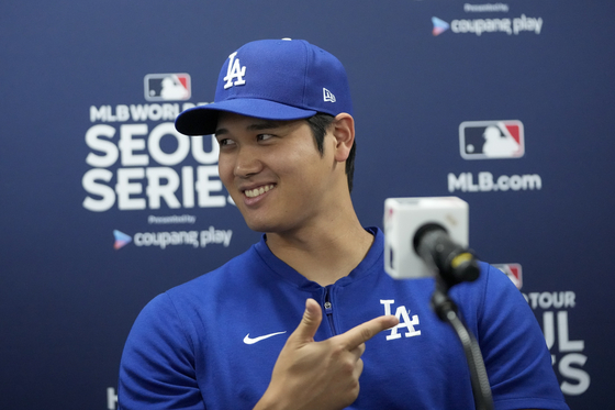 Los Angeles Dodgers' Shohei Ohtani speaks during a press conference ahead at Gocheok Sky Dome in western Seoul on Saturday.  [AP/YONHAP]