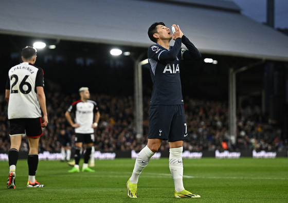 Tottenham Hotspur's Son Heung-min reacts during a 2023-24 Premier League match against Fulham at Craven Cottage in London on Saturday. [REUTERS/YONHAP]