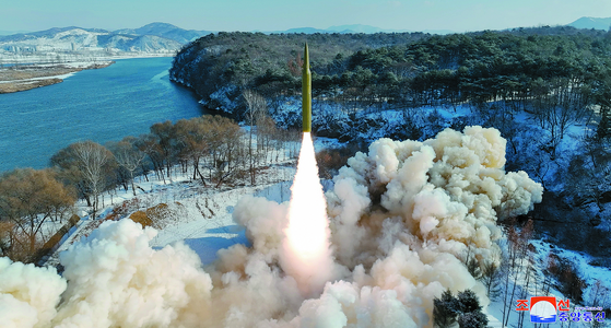 An intermediate-range ballistic missile is fired from an unspecified location in North Korea on Jan. 15, 2024, in this photo published by North Korea's state-run Korean Central News Agency. [YONHAP] 