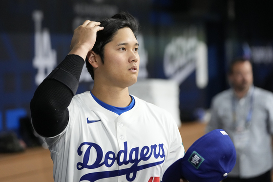 Los Angeles Dodgers' designated hitter Shohei Ohtani prepares for an exhibition game against Team Korea at Gocheok Sky Dome in western Seoul on Monday.  [AP/YONHAP]