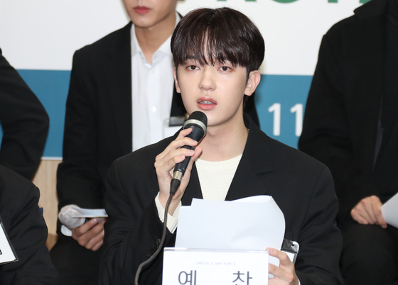 Member of boy band Omega X explains that the band had been abused by its then-agency Spire Entertainment's CEO in a press conference held on Nov. 16, 2022. [NEWS1]