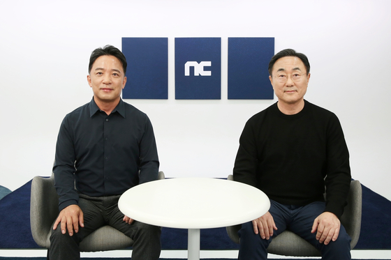 NCSoft founder and co-CEO Kim Taek-jin, left, and new co-CEO Park Byung-moo participate at the online press event on Wednesday to outline the company's plans for this year. [NCSOFT]