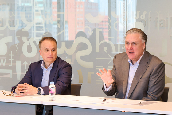 Paul Burton, general manager of the Asia-Pacific region at IBM, and Christopher Padilla, vice president for government and regulatory affairs, discuss deepfakes issue during a press event in Yeouido, western Seoul, on Wednesday. [IBM KOREA]