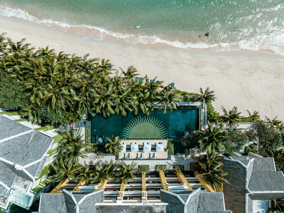 An aerial view of one of three beachside pools at the JW Marriot Emerald Bay resort in Phu Quoc, southern Vietnam. [SUN GROUP]