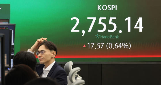 A screen in Hana Bank's trading room in central Seoul shows the stock market price as it opens on Tuesday. [YONHAP]