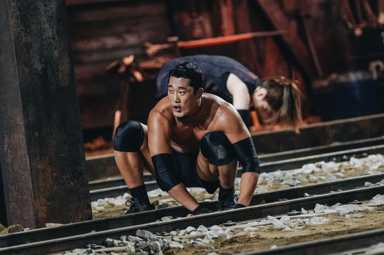 Retired UFC fighter Kim Dong-hyun competes in Season Two of Netflix's "Physical: 100." [NETFLIX]