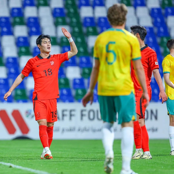 Korea's Kang Seong-jin, left, celebrates scoring a goal during the West Asia Football Federation (WAFF) Championship final at Al Fateh Stadium in Al Mubarraz, Saudi Arabia in a photo shared on the WAFF's official Instagram account on Tuesday. [SCREEN CAPTURE]