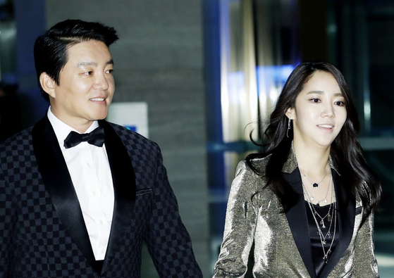 Actor Lee Beom-soo, pictured left, and his estranged wife Lee Yoon-jin [NEWS1]