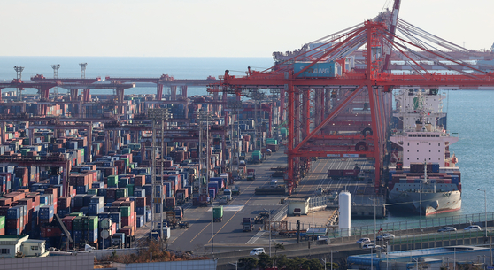 This photo taken on Dec. 1, 2023, shows shipment containers stacked at a port in Busan. [YONHAP]