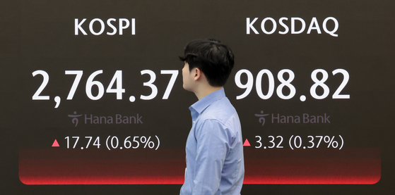 A screen in Hana Bank's trading room in central Seoul shows the stock market prices as it opens on Monday. [YONHAP]