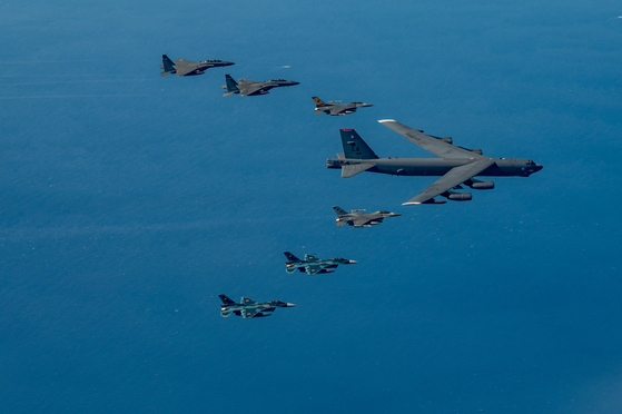 A U.S. B-52 strategic bomber takes part in a combined air exercise with South Korean F-35A fighter jets over the Korean Peninsula on Oct. 17, 2023. [YONHAP] 