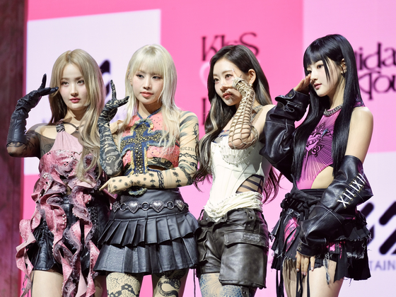 Girl group Kiss of Life poses for the camera during a press showcase for its first single ″Midas Touch,″ held Wednesday at the Yes24 Hall in Gwangjin District, eastern Seoul, ahead of the release of the single later that day. [DANIELA GONZALEZ PEREZ]
