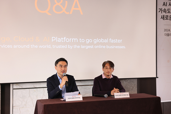 Gcore Korea's Country Manager Jung Hyun-yong, left, and Kim Jin-yong, head of pre-sales, speak at a local press event in central Seoul. [GCORE]