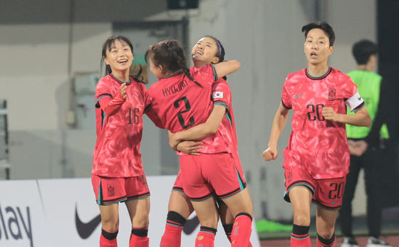 Korea's Choo Hyo-joo, center, celebrates with teammates during a match against the Philippines at Icheon Sports Complex in Icheon, Gyeonggi on Monday. [YONHAP]