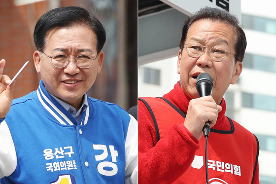 Democratic Party candidate Kang Tae-woong, left, and Peoople Power Party candidate Kwon Yong-se speak during their election campaign for the seat in Yongsan District on Monday. [NEWS1]