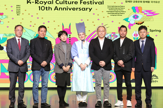 Organizers for this year's K-Royal Culture Festival, including Park Dong-woo, the director of this year's opening ceremony, third from right, pose for a picture during the press conference held on April 4 at the Korea House in central Seoul. [YONHAP] 