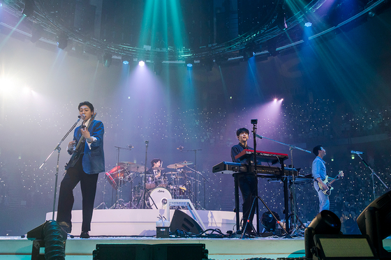K-pop rock band DAY6 performs its music during the ″Welcome to the Show″ concert at the Jamsil Indoor Stadium in southern Seoul on April 14. [JYP ENTERTAINMENT]