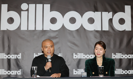 Billboard President Mike Van, left, and Billboard Korea publisher and CEO Yuna Kim answer questions from reporters during a press conference held on April 15 in southern Seoul prior to the launch of Billboard Korea in June. [YONHAP]