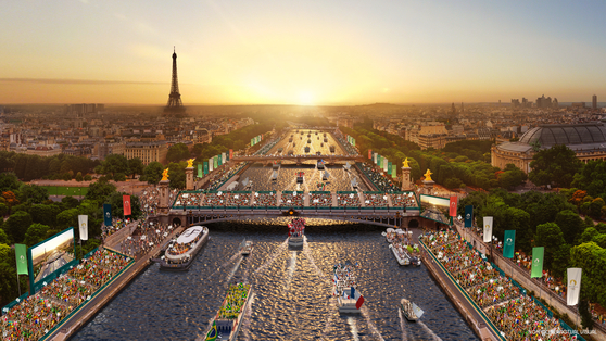 Aerial view of Paris during the upcoming Paris Olympics with Eiffel tower and Seine river [ATOUT FRANCE]