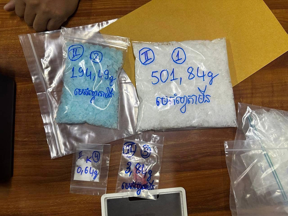 Packages of illicit drugs that were found at a hideout of a 38-year-old Chinese drug dealer in Cambodia [NATIONAL INTELLIGENCE SERVICE]