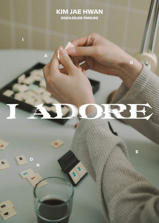 Promotional image for Kim Jae-hwan's upcoming seventh EP ″ I Adore″ [WAKEONE]