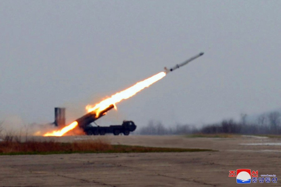 North Korea conducts a ″super-large warhead″ power test for a strategic cruise missile and a test-fire of a new anti-aircraft missile in the Yellow Sea on April 19 in this photo released by the Korean Central News Agency the following day. [YONHAP]