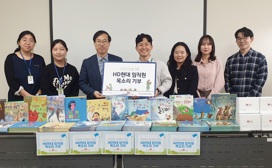 HD Hyundai 1% Nanum Foundation donates 15 audio book devices containing 180 volumes of fairy tales to support multicultural family support centers near its Bundang and Ulsan business sites. [HD HYUNDAI]