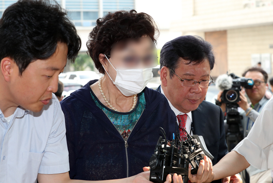 President Yoon Suk Yeol’s mother-in-law Choi Eun-soon enters the Euijeongbu District Court on July 21, 2023. [NEWS1]