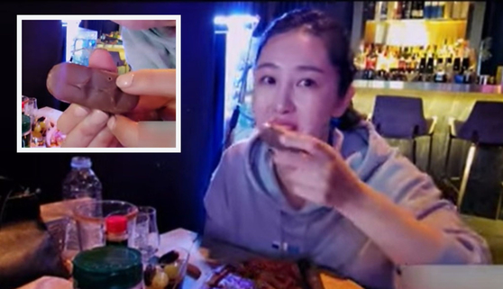 A female Youtuber posted a short video on Monday claiming a foreigner in Itaewon gave her a chocolate with a visible injection mark. [SCREEN CAPTURE]