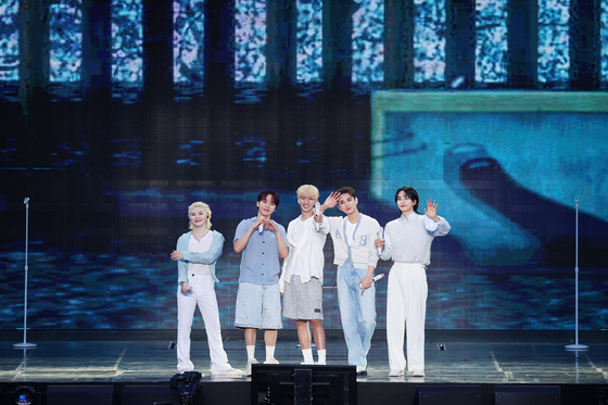 The vocal unit of Seventeen perform at the boy band's ″'Follow Again' in Seoul' encore concert held Saturday at the Seoul World Cup Stadium in Mapo District, western Seoul [PLEDIS ENTERTAINMENT]